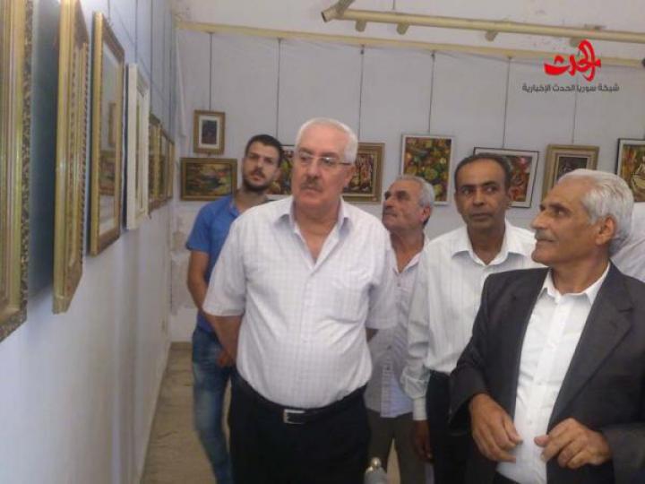 لوحات أحمد رحال تحمل الأمل في ألوانها  في المعرض المقام في نقابة الفنانين التشكيليين في حمص 