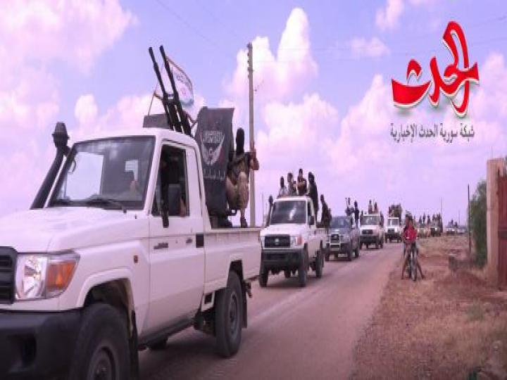 أكبر فصيل ارهابي في درعا يستعرض قواته وعتاده العسكري  رافضا التسويات والمصالحات