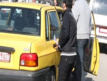 رئيس امتحانات جامعة دمشق يعمل سائق تكسي!!