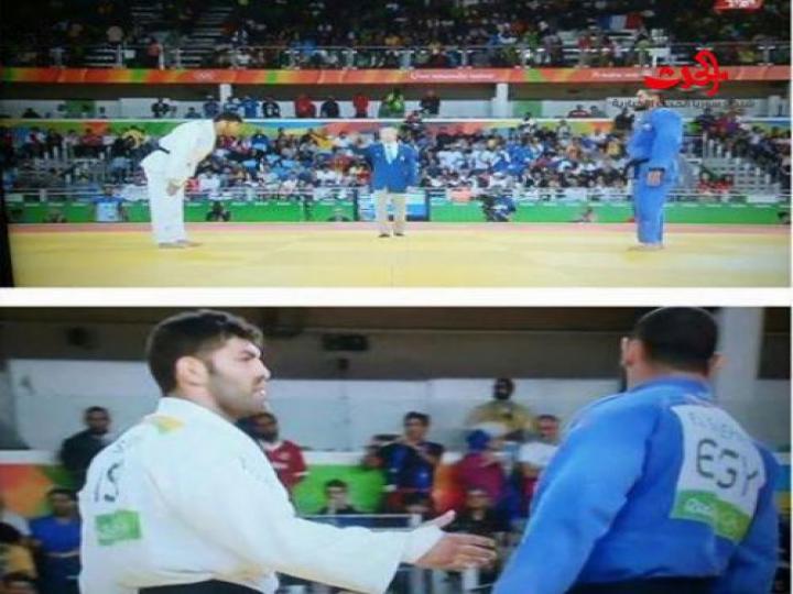 بالصور...لاعب الجودو المصري يرفض مصافحة خصمه الاسرائيلي في ختام المنافسة