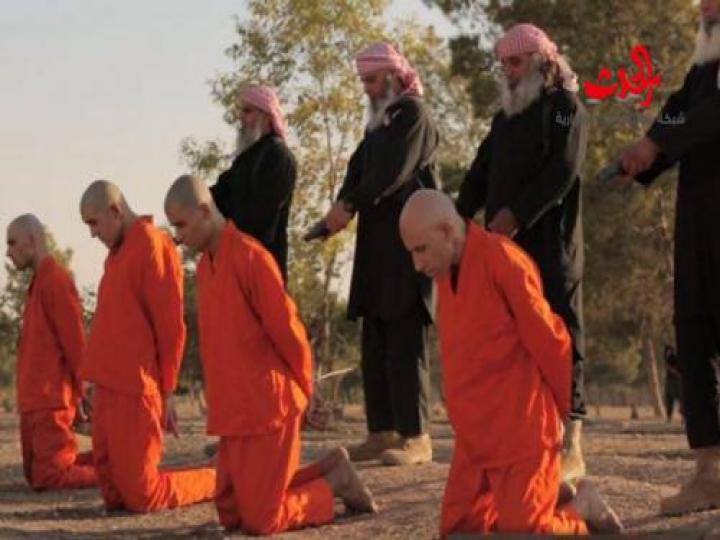 بالصور؛ مرة اخرى..داعش يمارس أسلوب الاعدام بأيدي أطفال