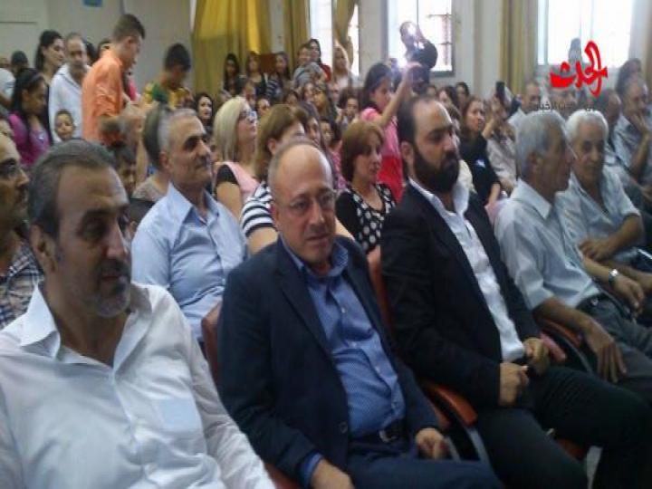 افتتاح مهرجان تشرين في مركز ثقافي الزهراء بحمص 