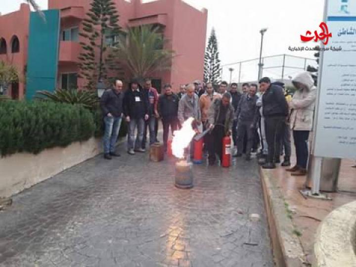 بيان عملي في الحريق للعاملين بمنتجع افاميا ضمن دورة الدفاع المدني المقامة بالمنتجع