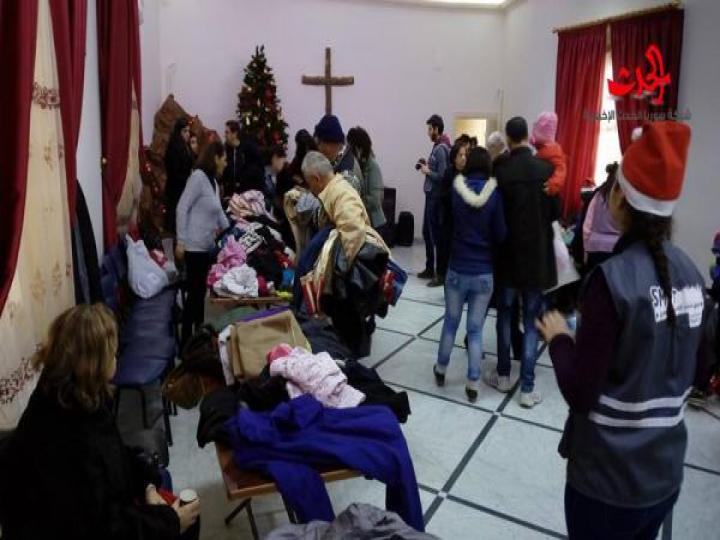 حملة دفا من قلوبنا توزع هدايا العيد في حمص 