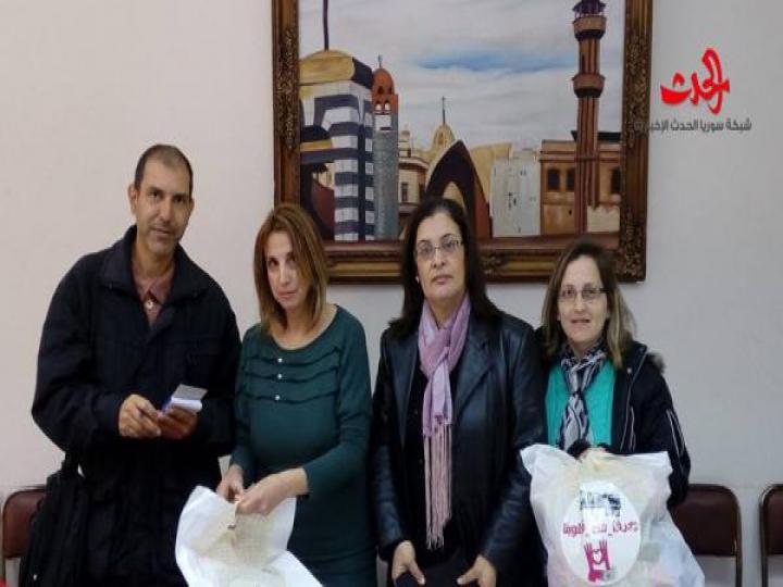 حملة دفا من قلوبنا توزع هدايا العيد في حمص 
