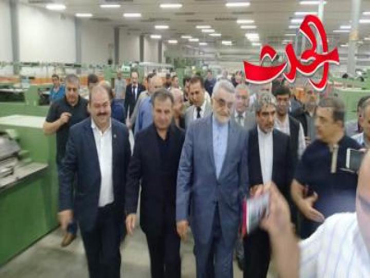 اللاذقية ; محافظ اللاذقية ورئيس الأمن القومي الايراني في زيارة لمعمل غزل ونسيج اللاذقية...