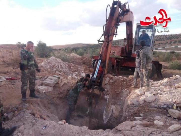 العثور على مستودع ونفق  أسلحة من مخلفات المسلحين  في مزارع نصيب