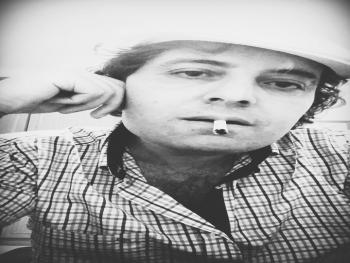 فمها الشهد بقلم الشاعر ناجي مخ