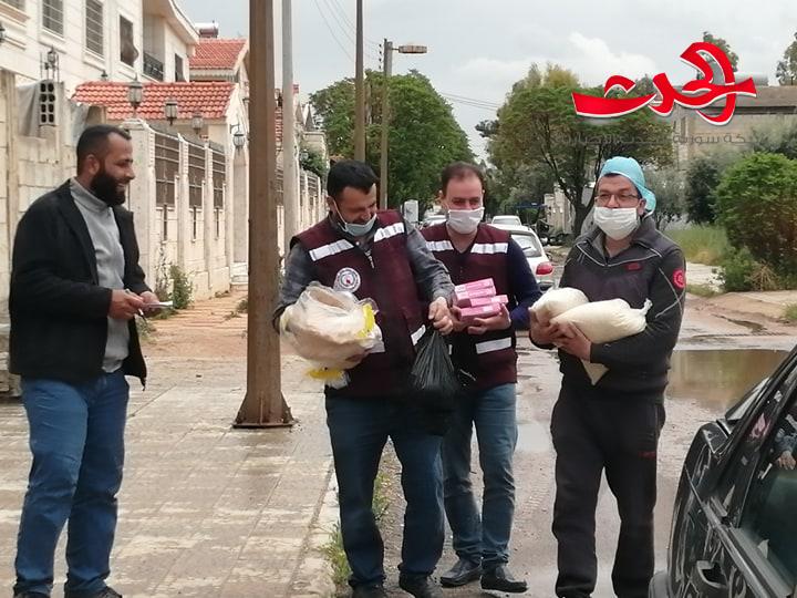 جمعية البر الخيرية تتابع عملها الخيري بتوزيع مساعدات للارامل والأيتام بحي الضاحية