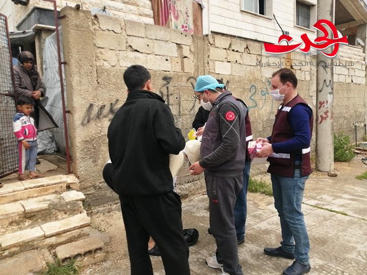 جمعية البر الخيرية تتابع عملها الخيري بتوزيع مساعدات للارامل والأيتام بحي الضاحية