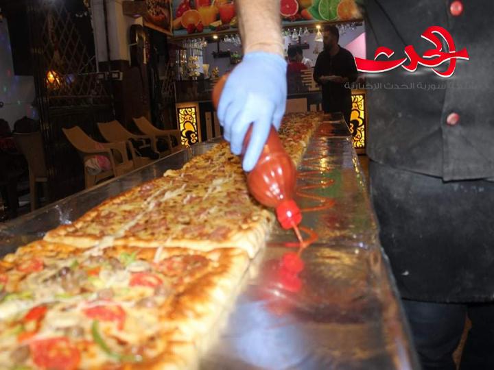 أكبر طبق بيتزا  في سورية.. صُنع في درعا