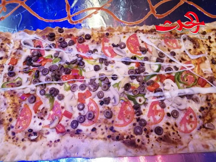 أكبر طبق بيتزا  في سورية.. صُنع في درعا