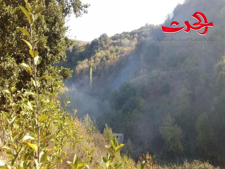 إخماد حريق بأشجار تفاح في أراضي حدية بريف حمص الغربي.